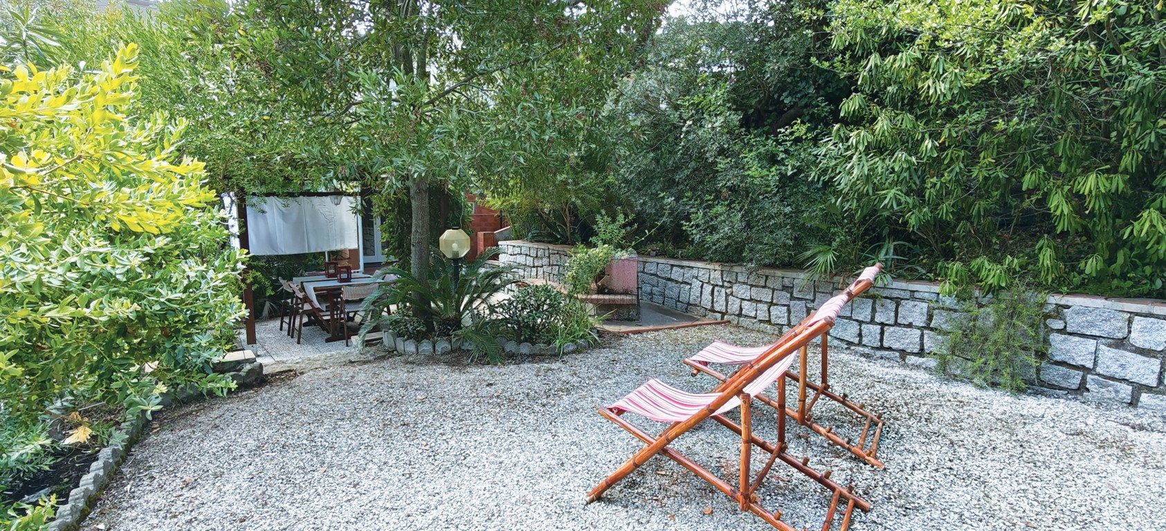 Appartamento ristrutturato con giardino e posto auto